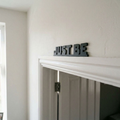 Handmade black acrylic Just Be sign for home and workspace
