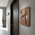 Walnut men’s toilet sign with left arrows for cafés, pubs and restaurants