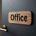 Walnut office sign mounted on a wooden office door