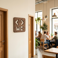 Walnut WC sign with left and right arrows for cafés, pubs and restaurants