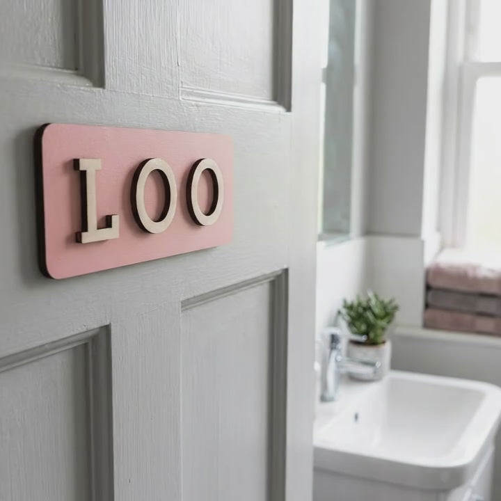 Wooden pink loo door plaque for home bathrooms, guest toilets and commercial restrooms